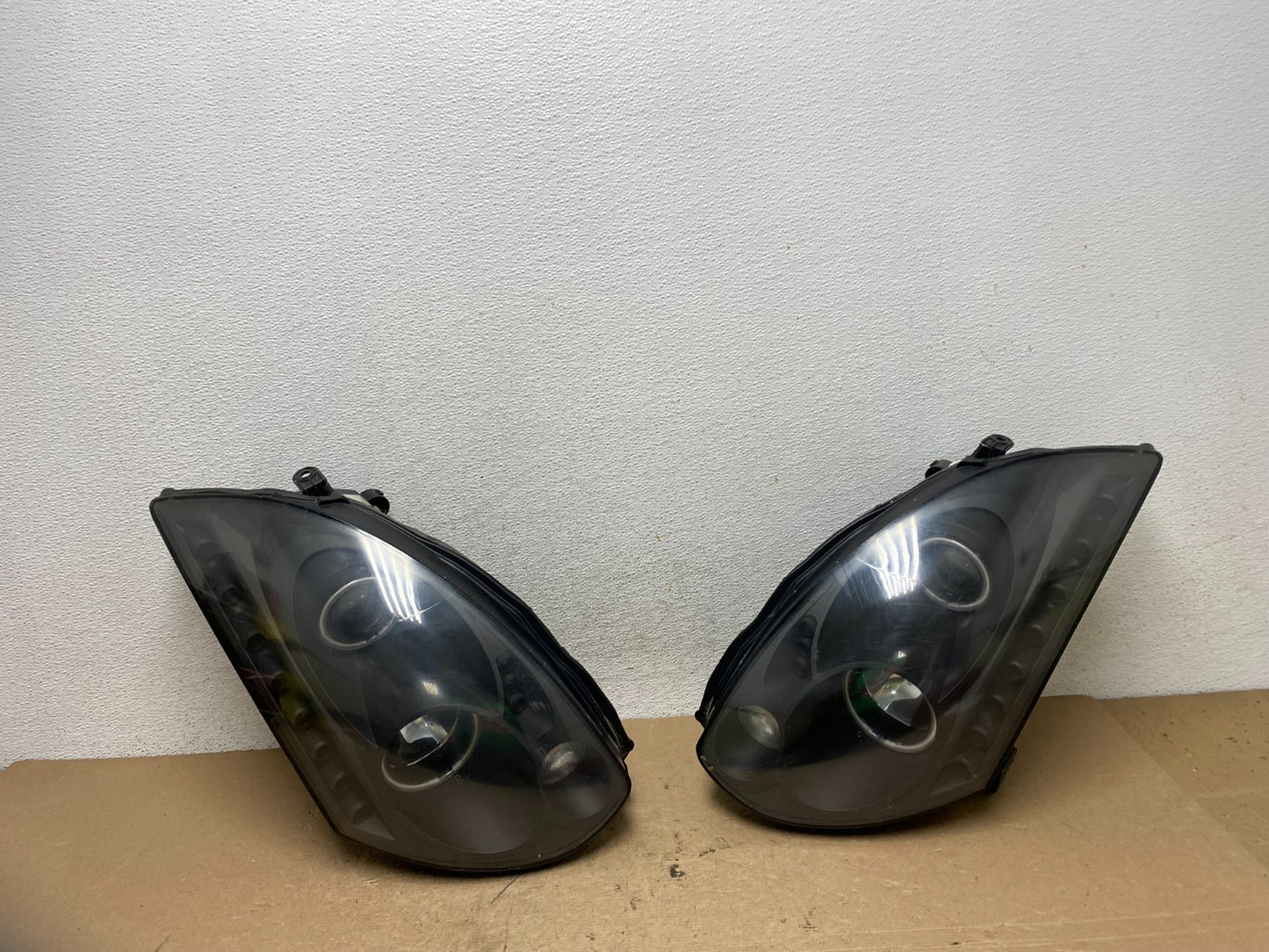 2003 to 2007 Infiniti G35 Coupe Left+Right Side Headlights AF50340