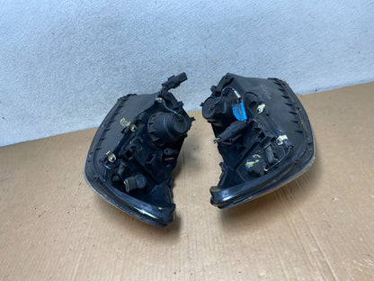 2000 to 2007 Ford Taurus Left+Right Side Halogen Headlights AI8873 DW15