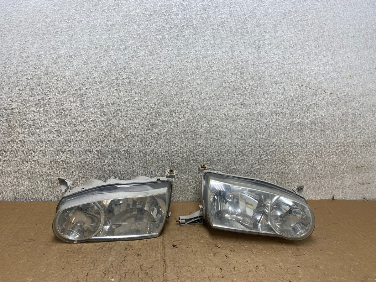 2001-2002 Toyota Corolla Left+Right Side Halogen Headlights V3834 DW0