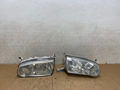 2001-2002 Toyota Corolla Left+Right Side Halogen Headlights V3834 DW0