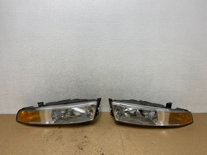 2002 to 2003 Mitsubishi Galant Left+Right Side Headlights AG2161 DW0
