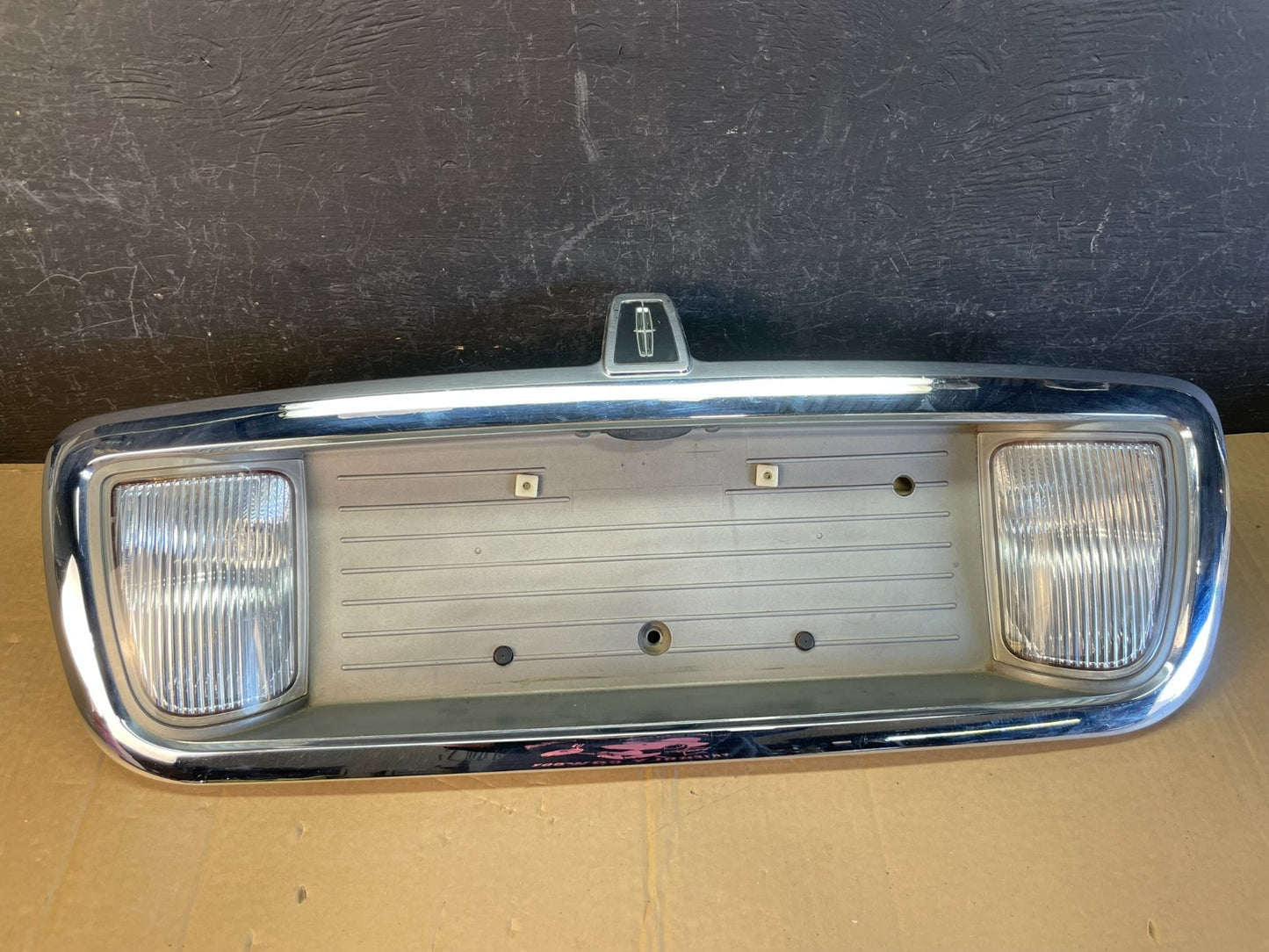 2003 to 2011 Lincoln Town Car Rear License Plate Trim Panel AC9715 DG0