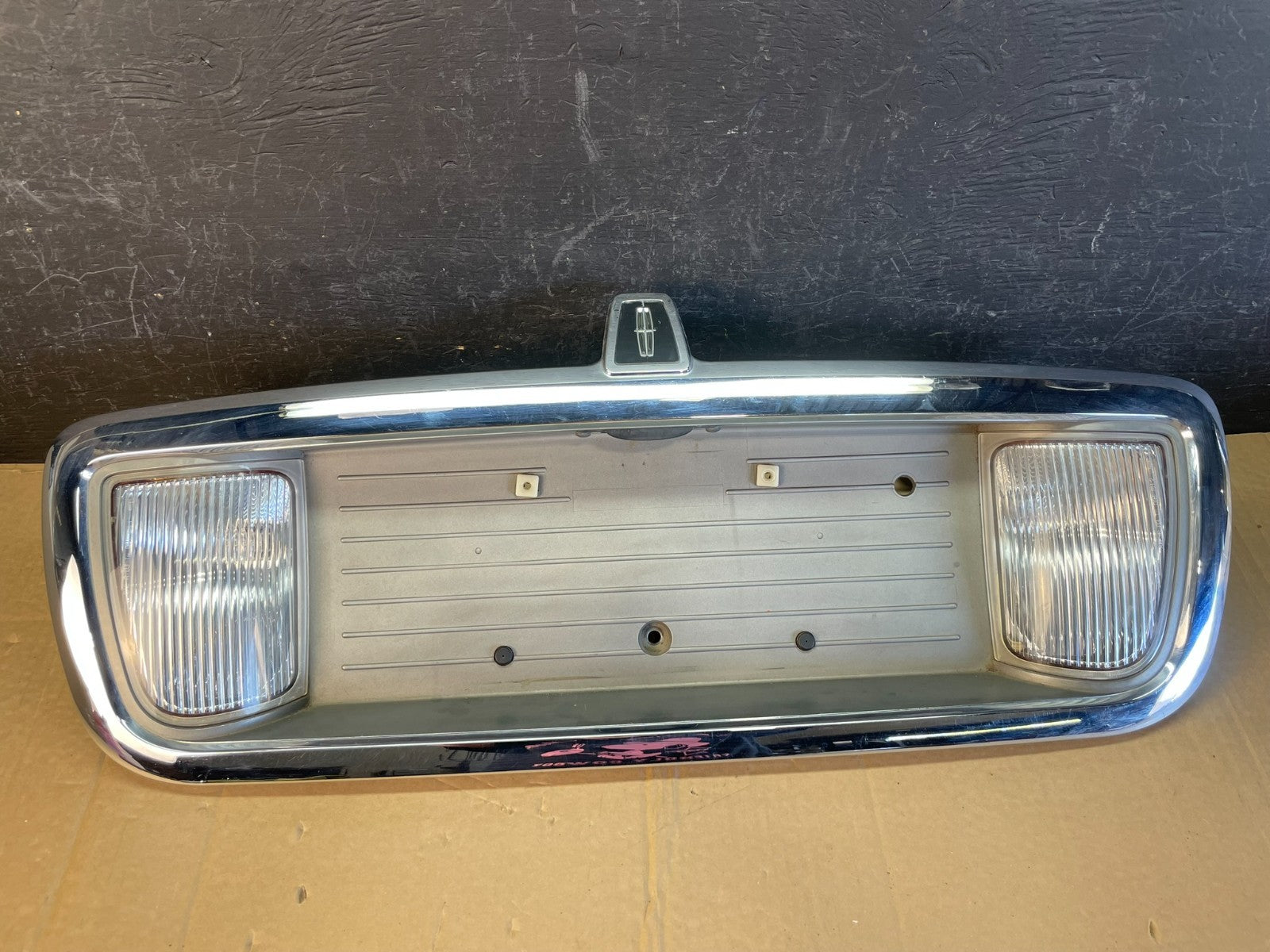 2003 to 2011 Lincoln Town Car Rear License Plate Trim Panel AC9715 DG0