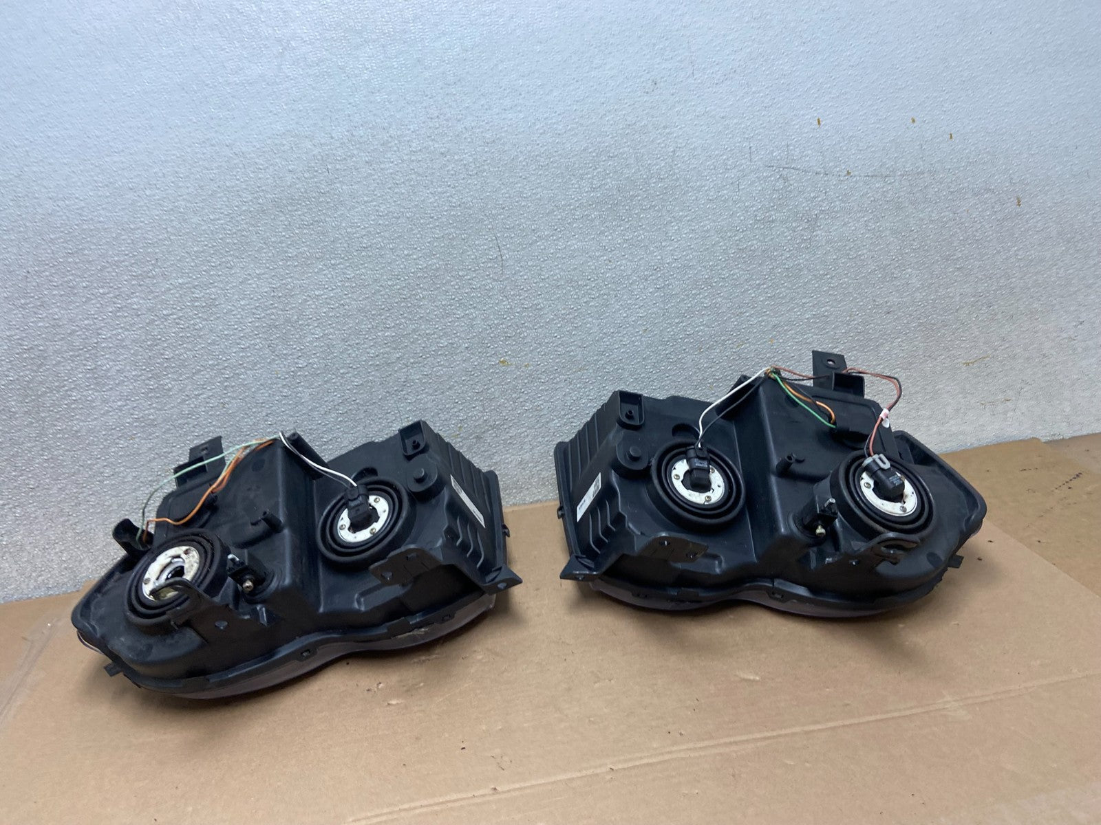 2009-2010 Jeep Grand Cherokee Left+Right Set Halogen Headlights AA9867 DW6