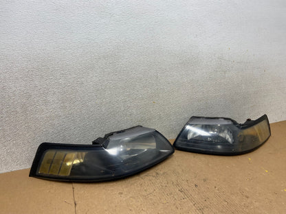 1999 to 2004 Ford Mustang Left+Right Set Side Black Headlights Z8043 DW2