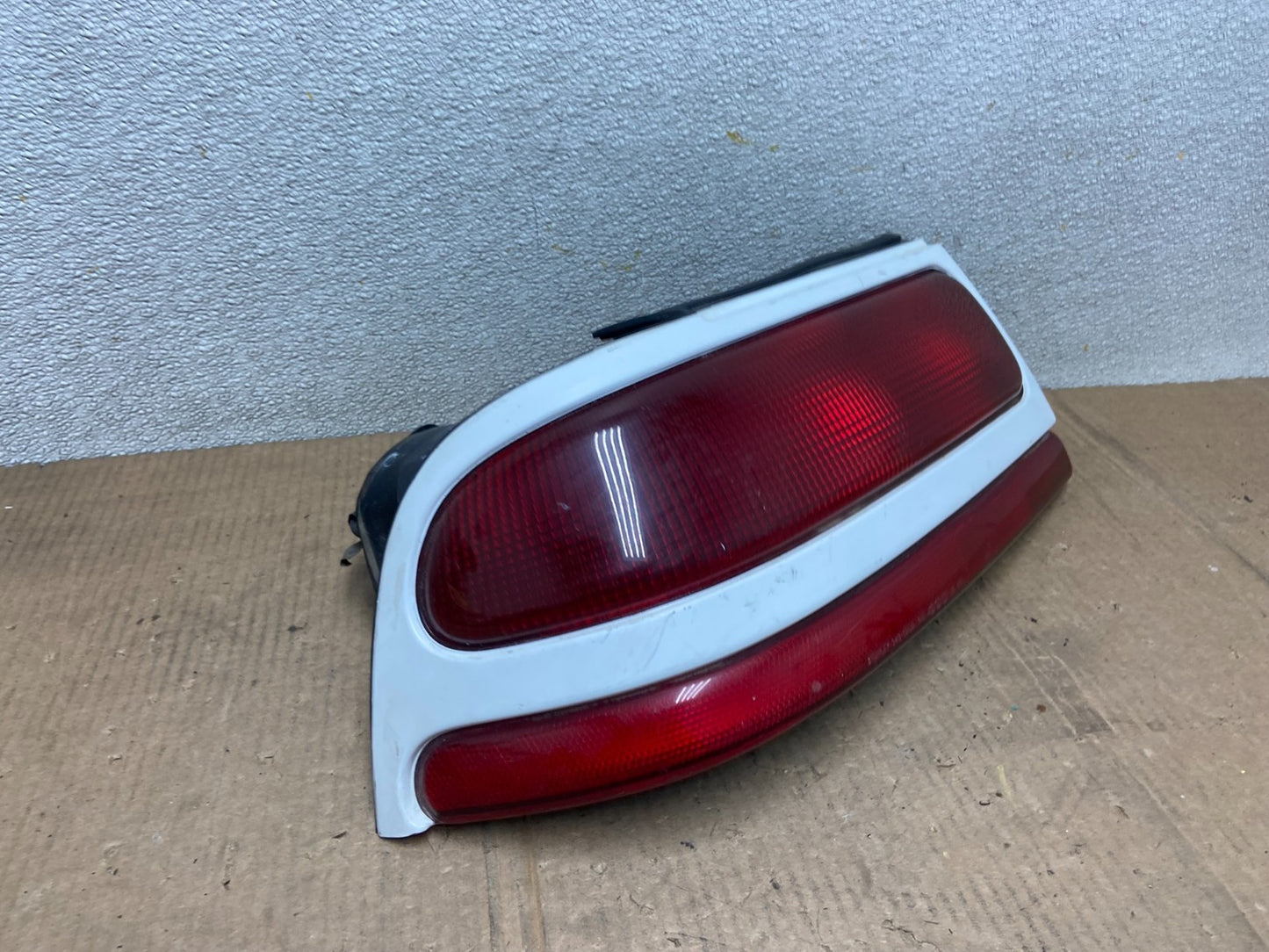 1992 to 1994 Plymouth Laser Left Driver Side tail Light AA64032
