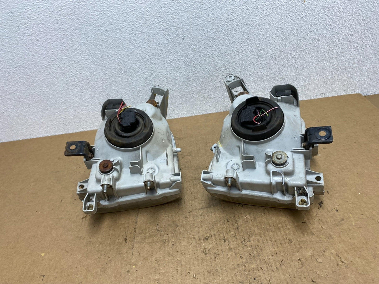 1999-2004 Nissan Pathfinder Left+Right Side Set Halogen Headlights AC3403 DW11