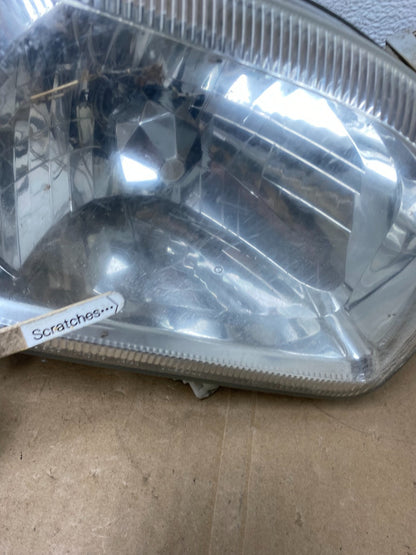 1999-2004 Nissan Pathfinder Left+Right Side Set Halogen Headlights AC5823 DW4