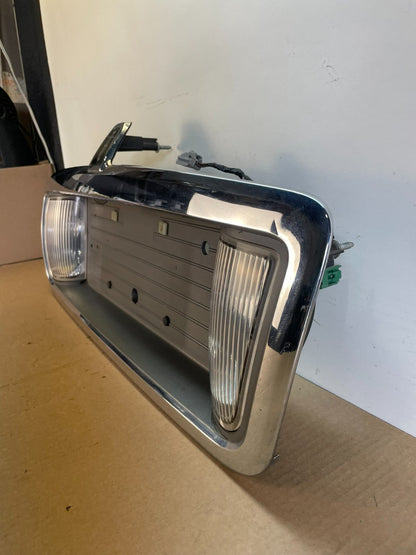 2003 to 2011 Lincoln Town Car Rear License Plate Trim Panel AH6422 DG1
