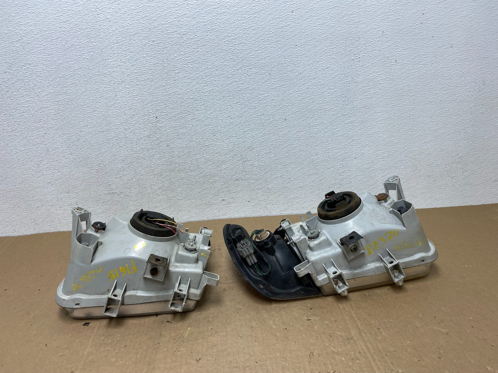 1999-2004 Nissan Pathfinder Left+Right Side Set Halogen Headlights AC5824 DW10