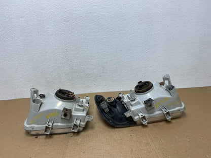 1999-2004 Nissan Pathfinder Left+Right Side Set Halogen Headlights AC5824 DW10