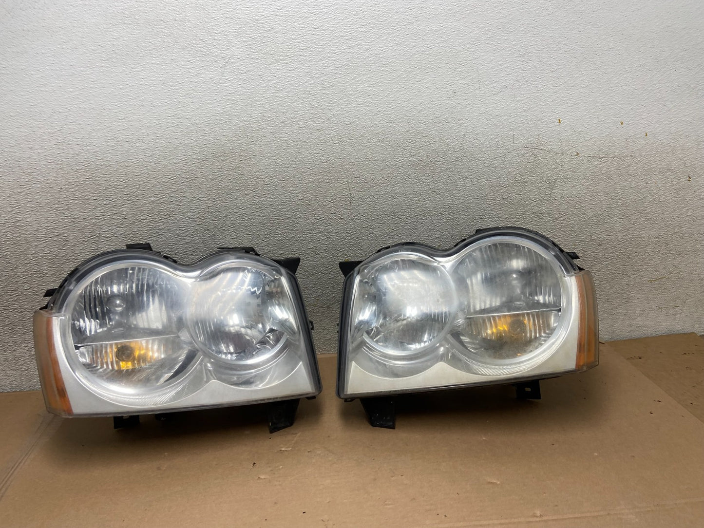 2005-2007 Jeep Grand Cherokee Left+Right Halogen Headlights AA9874 DW0