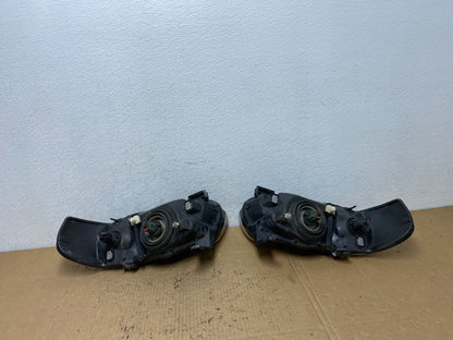 2004 - 2006 Nissan Sentra Halogen Left+Right Headlights AD2467 DW7