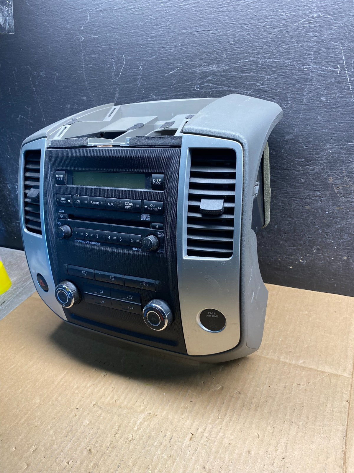 2009-2012 Nissan Frontier Xterra Radio Climate Control Bezel Center AI7700 DG4