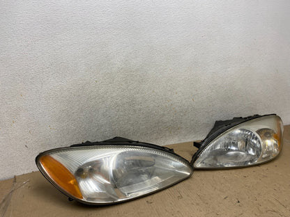 2000 to 2007 Ford Taurus Left+Right Side Halogen Headlights AH7649 DW1
