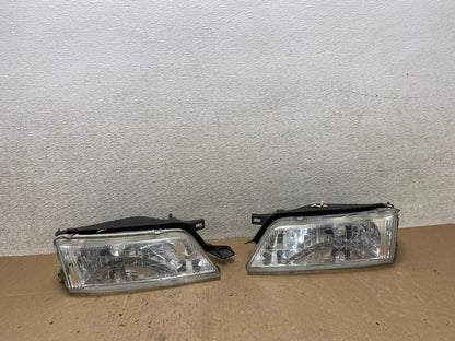 1997 - 1999 Nissan Maxima Left+Right Side Headlights Halogen OEM U0459 DW0