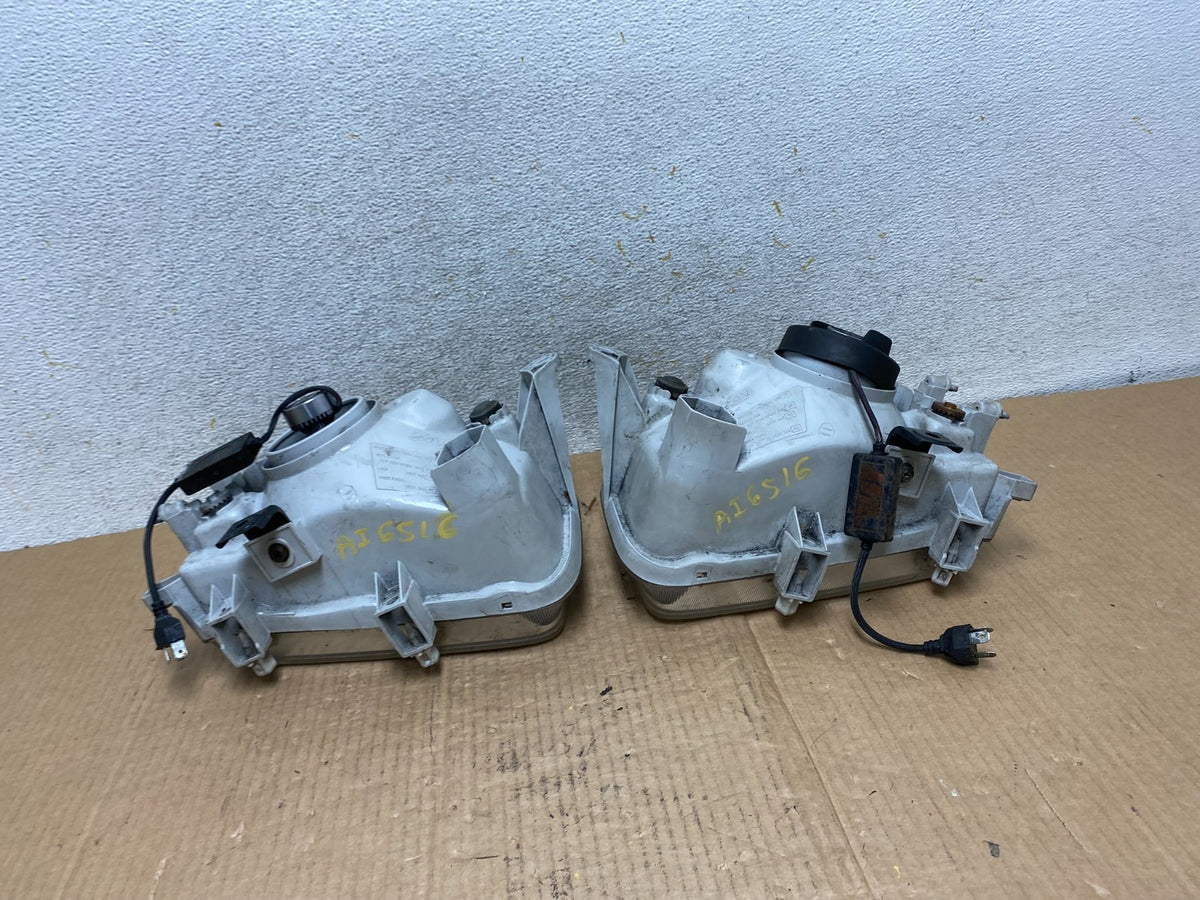 1999-2004 Nissan Pathfinder Left+Right Side Set Halogen Headlights AI6516 DW6