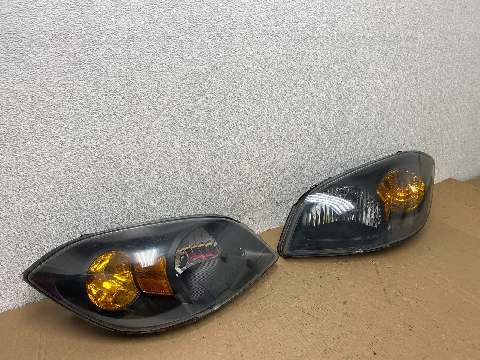 2005 - 2010 Chevrolet Cobalt Sedan Left+Right Set Headlights AD8035 DW2