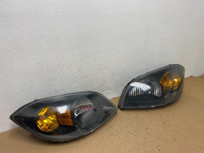 2005 - 2010 Chevrolet Cobalt Sedan Left+Right Set Headlights AD8035 DW2
