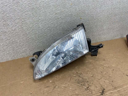 1998 to 2000 Toyota Corolla Front Left Driver Halogen Headlight AB4698 DW1