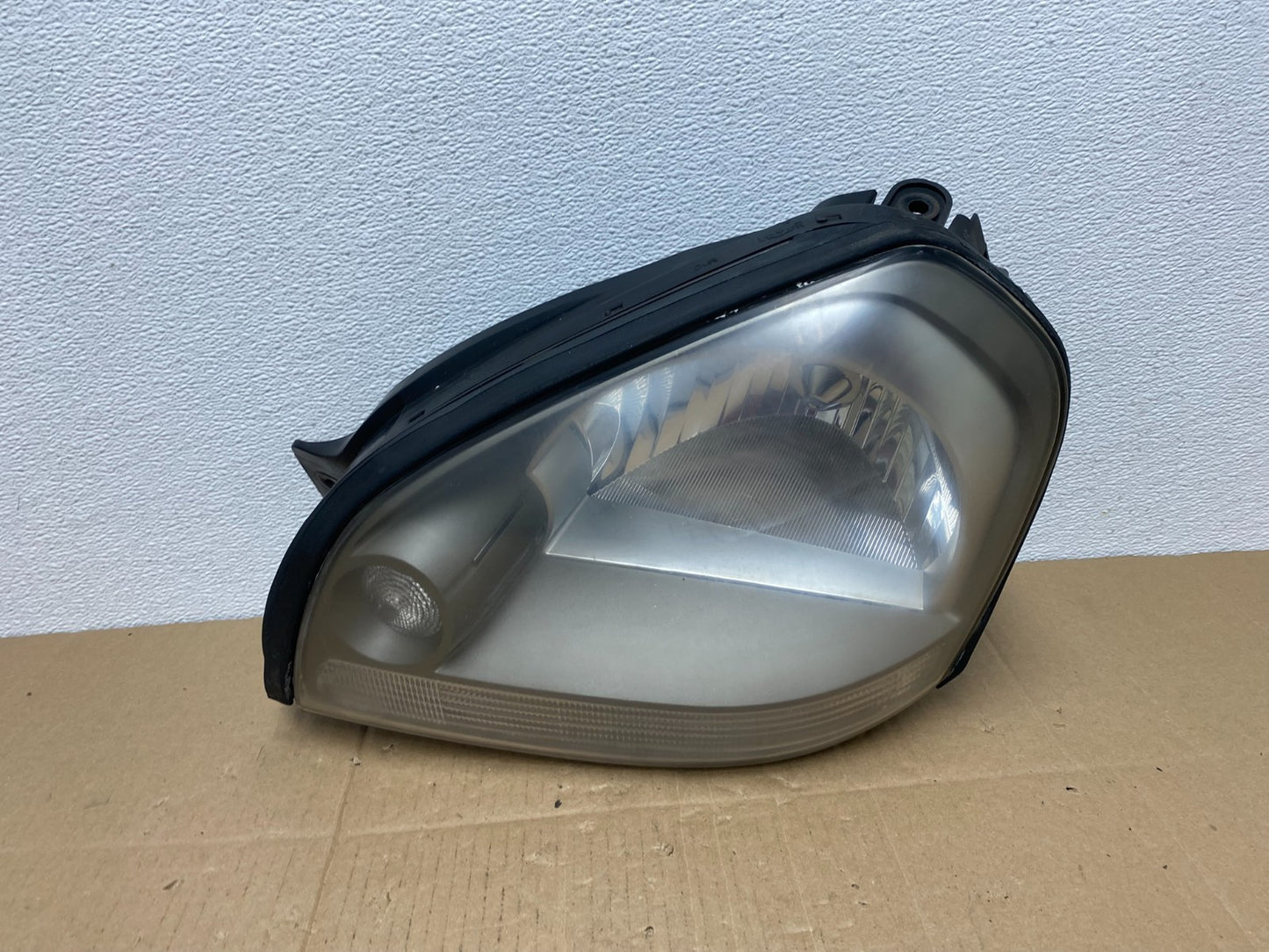 2005 to 2008 Hyundai Tucson Left Driver LH Side Headlight TYC AB8107 DW0