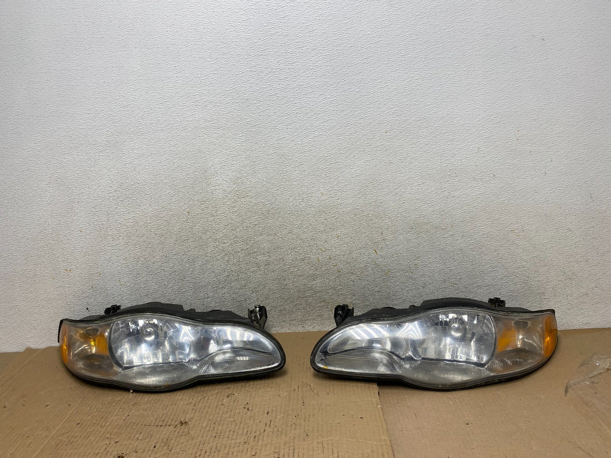 2000 to 2005 Chevrolet Monte Carlo Left+Right Side Set Headlights AI1351 DW0