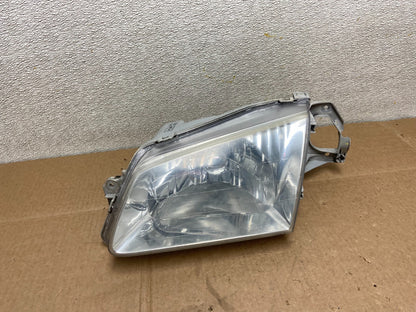 1999 to 2000 Mazda Protege Left Driver LH Side Headlight OEM Y8525 DW0