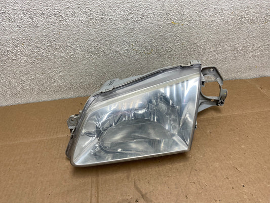 1999 to 2000 Mazda Protege Left Driver LH Side Headlight OEM Y8525 DW0