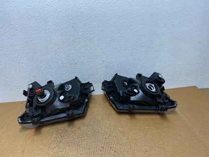 2005-2015 Nissan Xterra Driver Left+Right Side Set Headlights AE1364 DW5