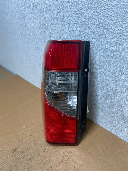 2002 2003 2004 Nissan Xterra Left Driver Side Tail Light AE1400 LK1